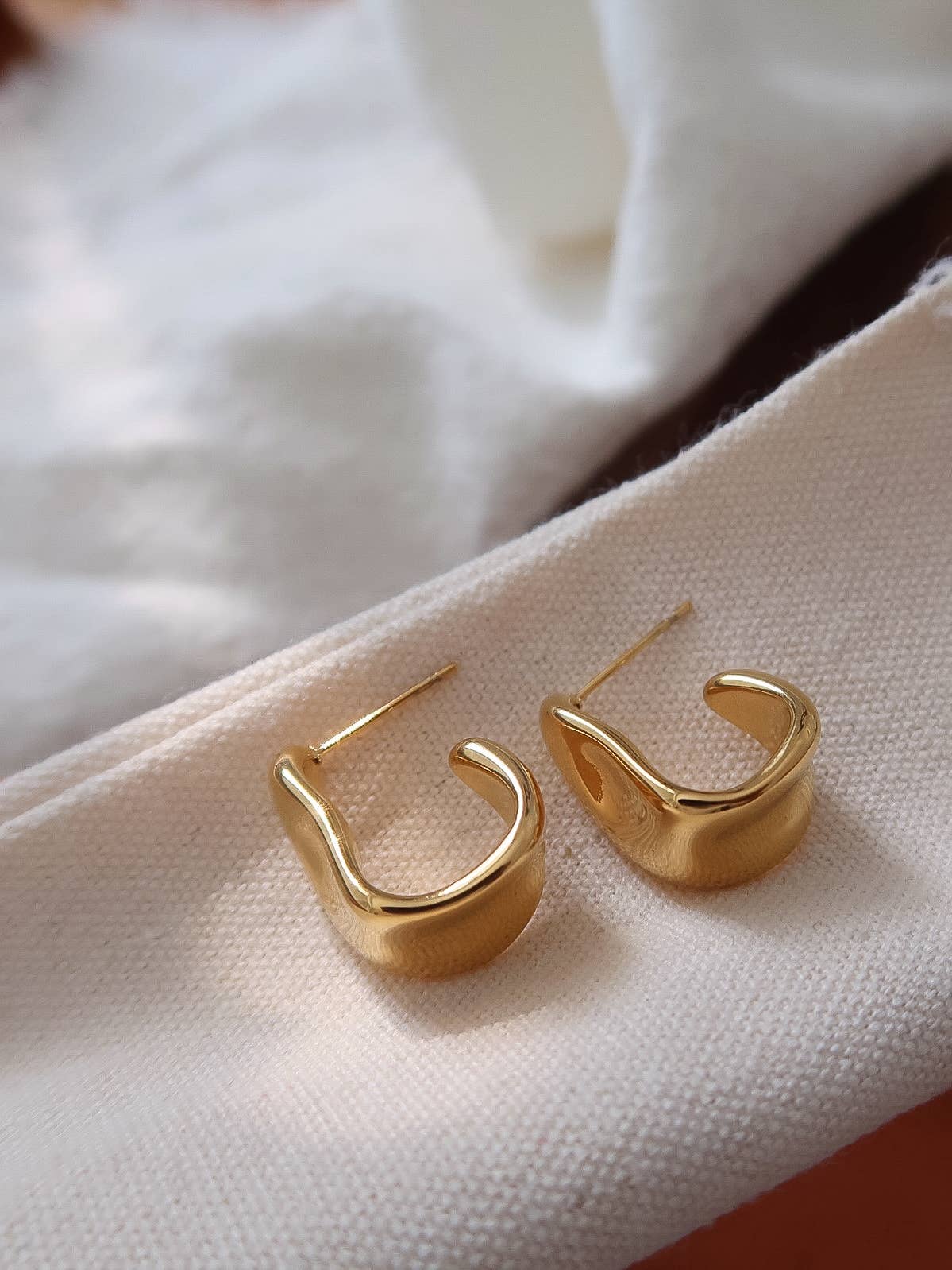 Ninelle 18K Gold Non-Tarnish Sculpted Wave Hoop Earrings