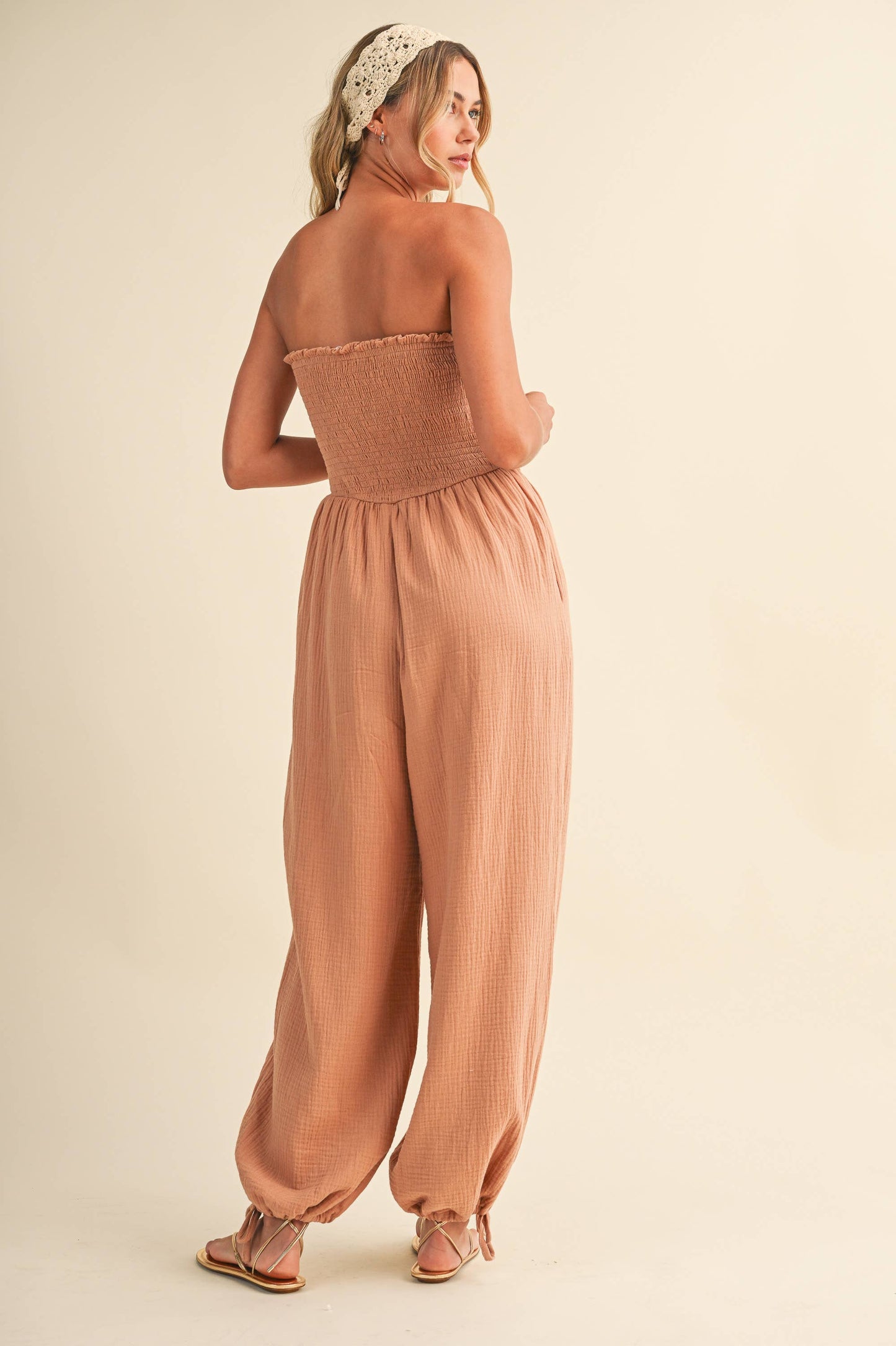 STRAPLESS SMOCKED CHEVRON WAIST ADJUSTABLE ANKLE JUMPSUIT